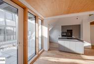 Erstbezug mit weitläufigem &amp; lichtdurchfluteten Wohnbereich, sowie 2 hofseitigen Freiflächen