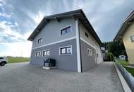 Mehrfamilienhaus mit Garage/Lager/Büro - Dorfwidmung