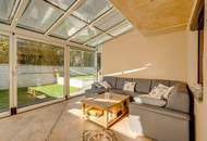 Attraktive Doppelhaushälfte mit sonnigem Wintergarten in ruhiger Lage