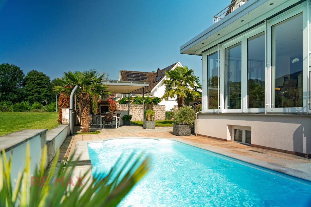 Exklusive Wohlfühloase – Elegantes Haus mit Gartenidylle