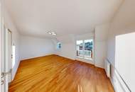 Helle Dachgeschosswohnung mit sonniger 7 m² Westterrasse und Garagenplatz in absoluter Ruhelage