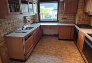 Mehrfamilienhaus mit Geschäftslokal