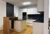 Neubau-3-Zimmer mit 14 m²-Balkon, Tiefgarage & Blick auf den Wienerberg