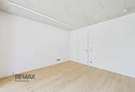 Moderne 3-Zimmer-Erstbezugswohnung mit privatem Garten, großen Fensterfronten und viel Tageslicht