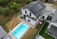 Einfamilienhaus mit großzügigem Wohnkonzept, Pool und attraktivem Außenbereich