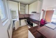 3-Zimmer-Neubauwohnung mit Westbalkon & Garage in ruhiger Grünlage