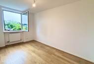 Sanierte Wohnung mit Schrebergarten