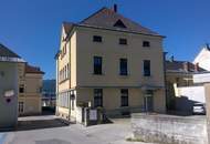 Postgebäude mit Geschäfts- Büro- und Wohnflächen