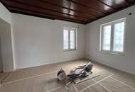 Traumhafte 4-Zimmer Wohnung mit Garten und ausbaubarem Dachgeschoss