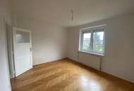 Charmante 3 Zimmer -Wohnung mit Garten und optionalem Parkplatz