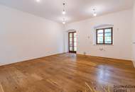 Charmante 2,5-Zimmer-Wohnung mit gemütlichem Eigengarten im Palais Löwenfeld ab sofort zu vermieten!