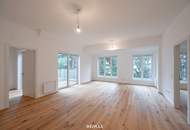 Sanierter Altbau mit modernem Neubau