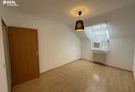 Ruhige 3-Zimmer-Dachgeschosswohnung mit Balkon und Tiefgaragenplatz