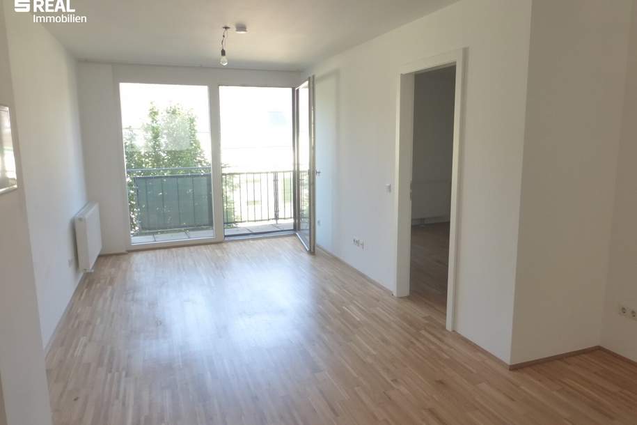 Attraktive, sonnige Neubauwohnung mit Balkon und Garagenplatz - 32 m² (!) Wohnzimmer, Wohnung-kauf, 265.000,€, 1220 Wien 22., Donaustadt