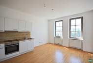 3-Zimmer-Altbau mit hofseitigem Schlafzimmer und Gemeinschaftsterrasse