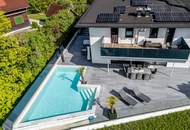 STARTPREIS! Luxuriöse Doppelhaushälfte mit Pool und Seeblick in Fuschl