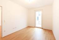 Sonnige Wohnung mit Blick ins Grüne, Balkon und Garage!