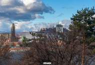 Wohnen über den Dächern von Graz mit Blick auf den Schlossberg: Exklusive Stadtwohnung mit Terrasse