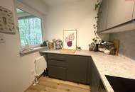Einzigartige Wohnatmosphäre in grüner und dennoch zentraler Lage! Attraktive 2-Raum-Wohnung mit Balkon!