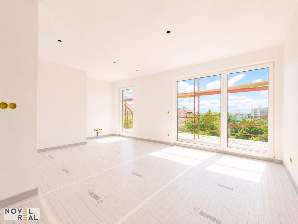 NEU | Exklusive Preisaktion bis 30.06 | Großzügige DG-Wohnung mit zwei Balkonen und Parkblick! | Bestlage Schlingermarkt / SCN