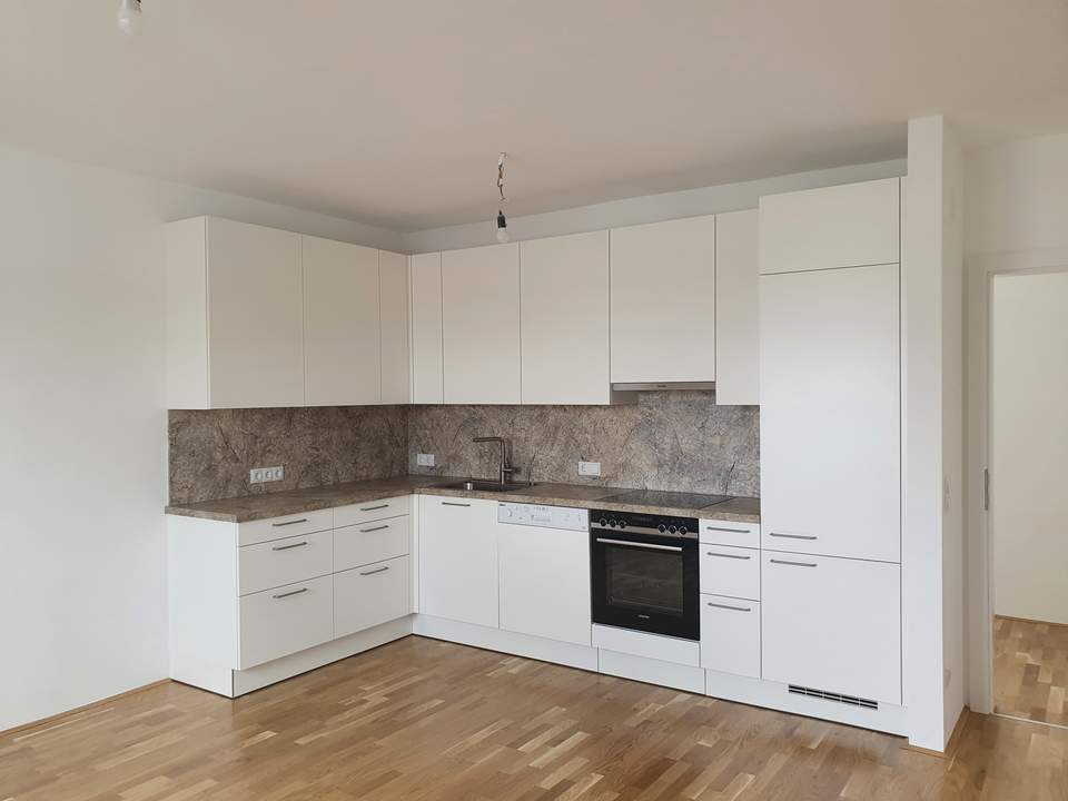 LEISTBARE FAMILIENWOHNUNG IN HAUPTPLATZ- UND BAHNHOFSNÄHE