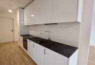 Sonnwendviertel: 1-Zimmer-Wohnung mit Balkon in der 16. Etage – Fitnessraum, Co-Working &amp; Rooftop-Terrasse inklusive!