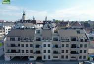 Gartenwohnung mitten in der Stadt! Karmeliterhof - Neubauwohntraum beim Rathausplatz