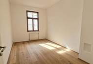 Stilvolle 2-Zimmer-Altbauwohnung im Zentrum – Erstbezug nach Generalsanierung!