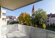 Hochwertig möblierte Luxuswohnung in Bestlage! 3 Zimmer | Überdachter Balkon | Tiefgaragenplatz inklusive| Blick ins Grün | Zwichen Bahnhof und Innenstadt gelegen