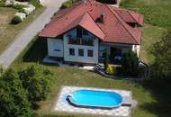 Großzügiges Einfamilienhaus mit Pool und Sauna im Grünen