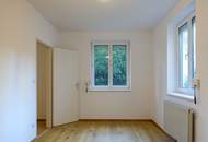 Gartenwohnung mit zwei Zimmern, Terrasse & Tiefgarage im Pressbaumer Zentrum