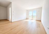 Erstbezug mit Weitblick: Moderne 2-Zimmer-Wohnung mit Westbalkon im naturnahen Hirschfeld