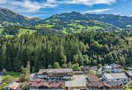 3.800 m² Baugrund mit Kaiser-, Hahnenkamm- und Südberge-Blick