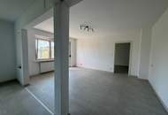 Vermietete Anlegerwohnung mit Balkon und moderner Küche in zentraler Lage