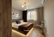 Exklusive 3-Zimmer-Dachgeschoss-Oase mit sonnigem Balkon & grünem Innenhof