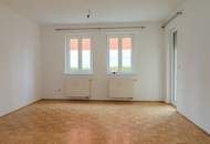 Freundliche Erdgeschosswohnung mit Tiefgaragenplatz und Loggia