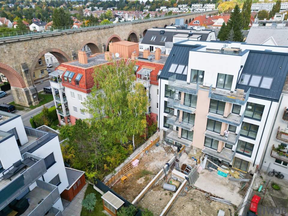 Südseitiger Eigengarten | Erstbezug | 2 Zimmer-Gartenwohnung | ruhiger Innenhof | Luftwärmepumpe | optionaler Tiefgaragenplatz