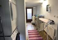Unterkellertes Einfamilienhaus mit Garage und Obstbaumbestand