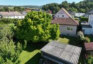 Ein-/Mehrfamilienhaus mit gepflegtem Garten