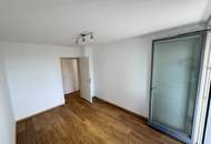 Traumlage bei der UNO-City – moderne Wohnung mit Loggia