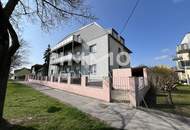 Miethaus mit 9 Wohnungen, Gemeinschaftsgarten und Carports