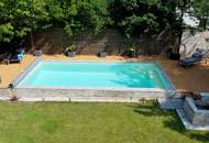 Lebensqualität pur: Großzügiges Einfamilienhaus mit traumhafter Pool-Landschaft