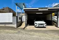 Charmante Dachgeschosswohnung mit Eigengarten & Doppelcarport