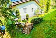 Wohnkomfort in idyllischer Lage - hinreißender Bungalow mit malerischem Garten in Seefeld!