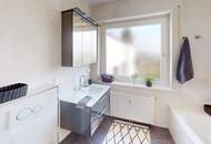 Moderne Dachgeschoss-Maisonette in Wien-Mauer mit zwei Balkonen, Garage und Liftzugang auf beiden Ebenen | ZELLMANN IMMOBILIEN