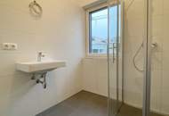 Topmoderne 2-Zimmerwohnung mit Eigengarten und Tiefgaragenstellplatz!