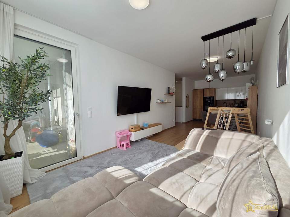 BALKONWOHNUNG MIT TIEFGARAGE IN TOPLAGE! BRILLIANTER 3-ZIMMER GRUNDRISS MIT FERNBLICK UND RUHELAGE! NAHE U1 KAGRANER PLATZ.