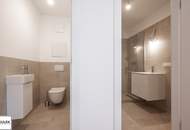 Wohnen im Bel Atrium: Zwei Zimmer Neubau Wohnung mit Balkon, inkl. Stellplatz und vielen Extras