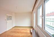 Sanierungsbedürftige Eigentumswohnung mit großzügiger Terrasse