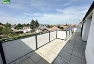 Wohnen im Grünen! Klimatisierte Wohnung mit Weitblick und großer Terrasse in Essling! Lobau und Kirschenallee ums Eck!